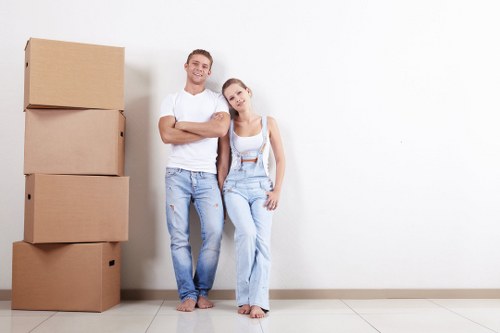 Furniture removal team planning a move in a Notting Hill residential street