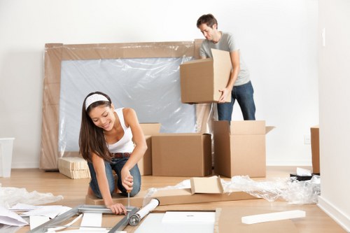 Office removals planning in Nottinghill with moving boxes and desks