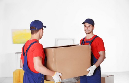 Staff coordinating an office move with transport and setup support
