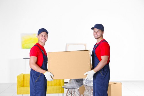 Removal crew preparing belongings for a UK house move