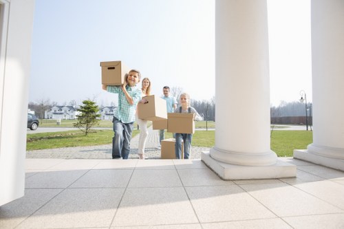 Students preparing boxes for a move in Nottinghill