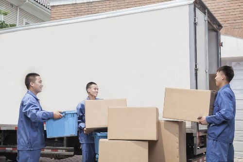Piano movers protecting an instrument during a Nottinghill house move