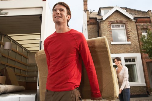 Sofa and wardrobe collection during furniture pick-up in Nottinghill