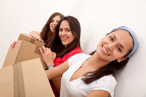 Careful loading of student belongings for a move in Notting Hill