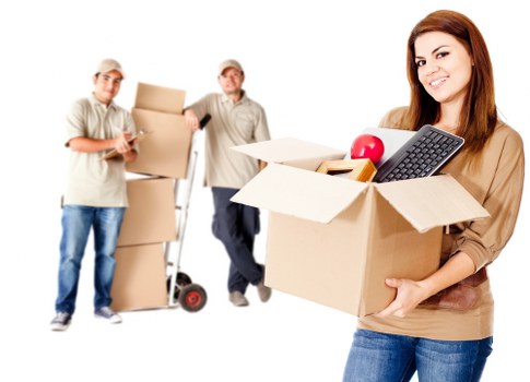 Student packing fragile items for relocation in Nottinghill